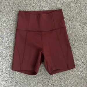 Girlfriend collective high rise running shorts in Sedona